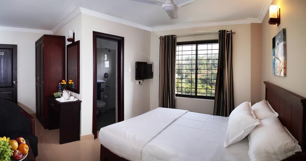 Century Grand Hotel Mananthavady Phòng bức ảnh