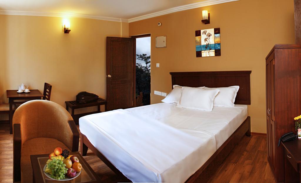 Century Grand Hotel Mananthavady Phòng bức ảnh